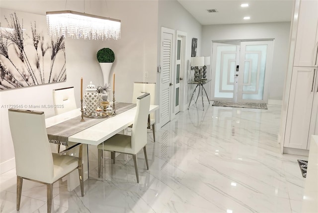 dining space featuring marble finish floor, recessed lighting, visible vents, and french doors