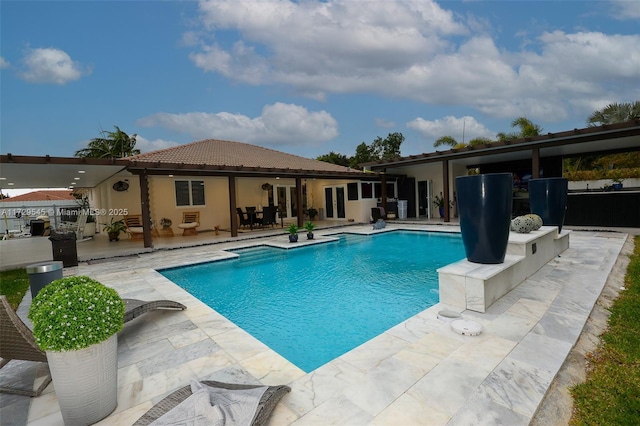 pool featuring a patio area