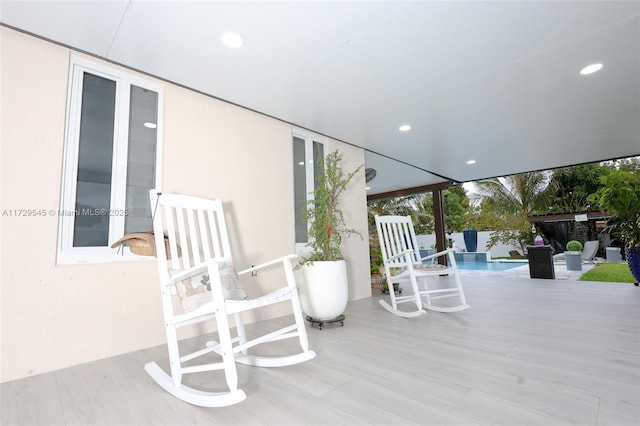 view of patio / terrace with an outdoor pool