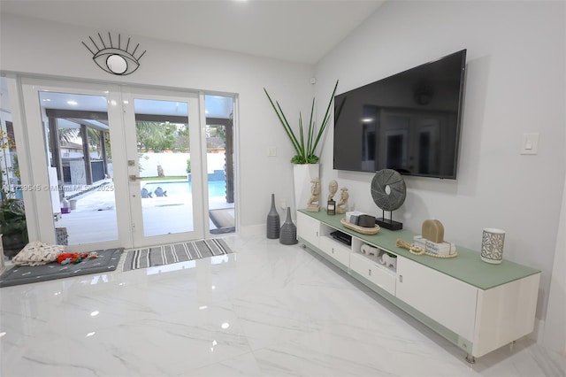 interior space with marble finish floor and french doors