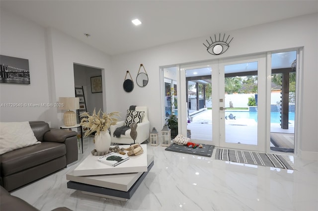 living area with marble finish floor and a wealth of natural light