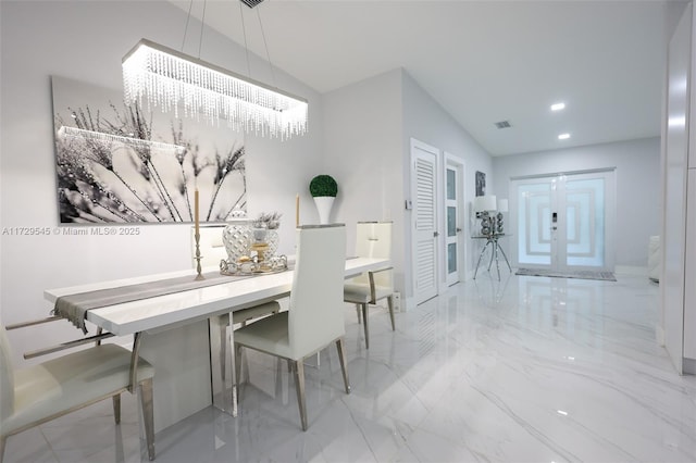 dining area featuring recessed lighting, marble finish floor, and visible vents