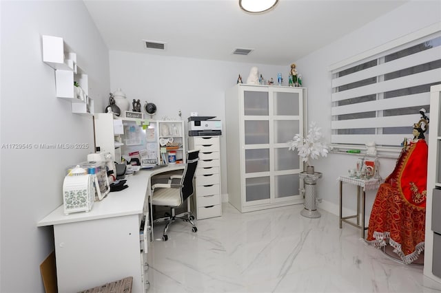 home office with marble finish floor and visible vents