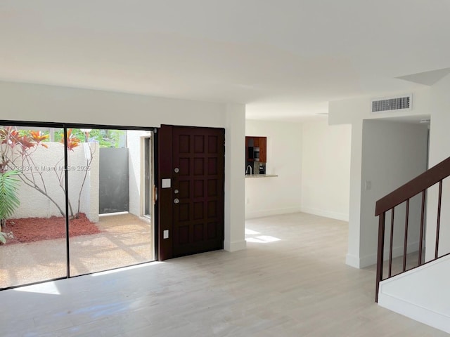 entryway featuring light wood-type flooring