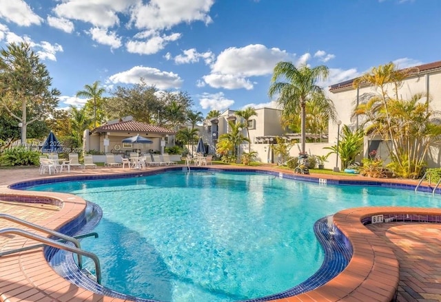 view of swimming pool featuring a patio