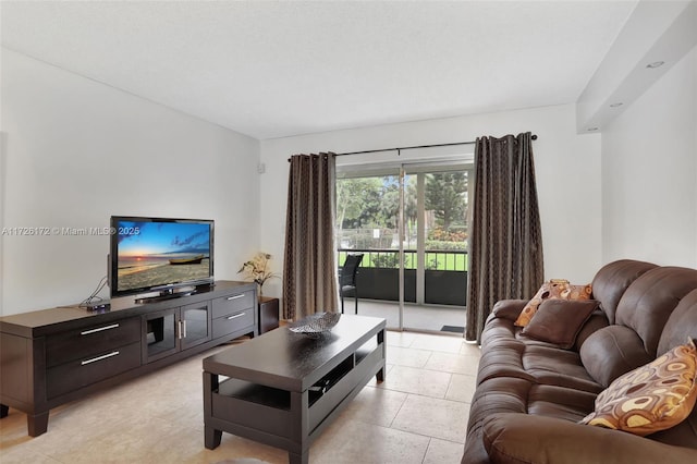 living room with light tile patterned floors