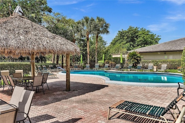 view of pool featuring a gazebo and a patio area