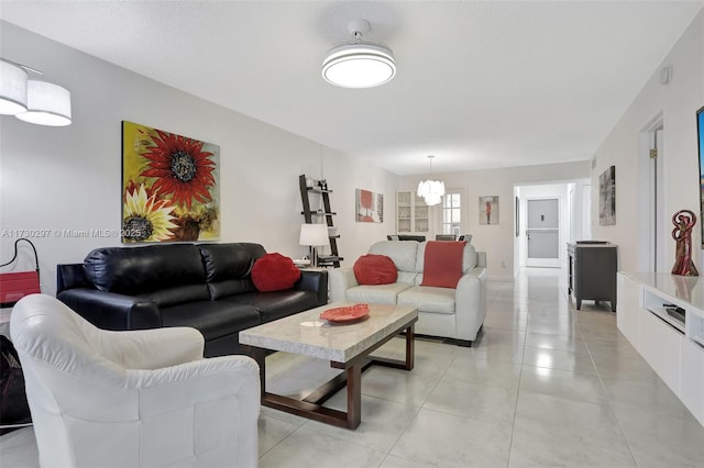 living room featuring a chandelier