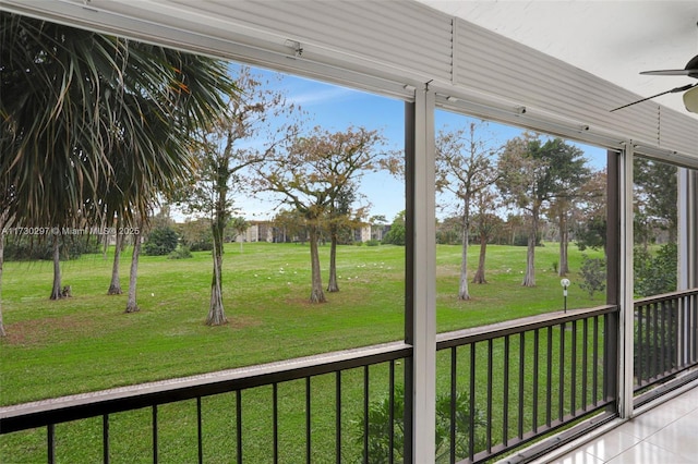 view of yard with ceiling fan