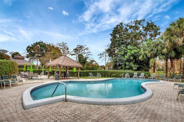 view of pool with a gazebo and a patio