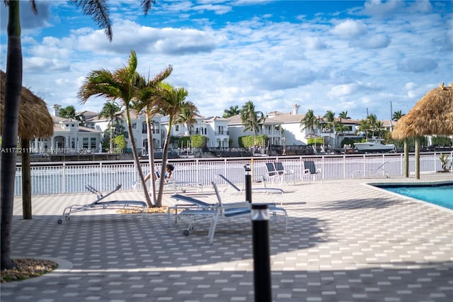 view of swimming pool featuring a patio area