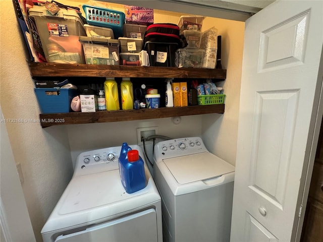 clothes washing area with independent washer and dryer