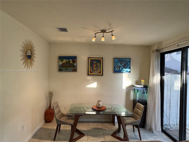 view of tiled dining space