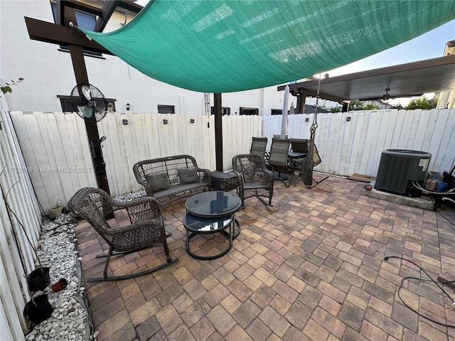 view of patio / terrace with an outdoor hangout area and central air condition unit