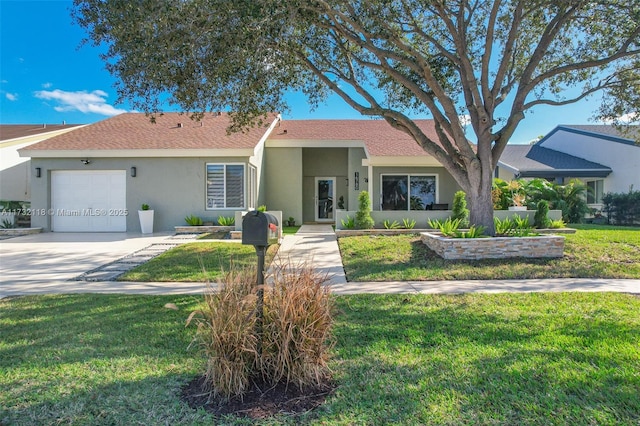 ranch-style house with a garage and a front yard