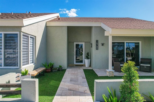 entrance to property with a patio area