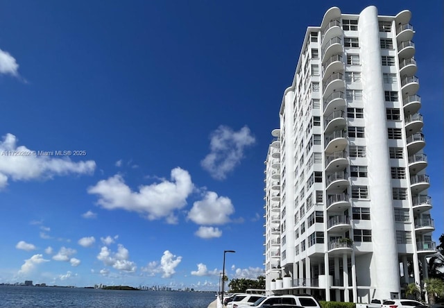 view of property with a water view