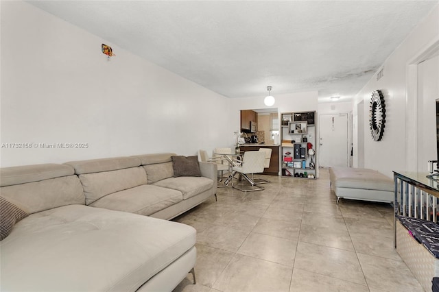 living room featuring light tile patterned floors