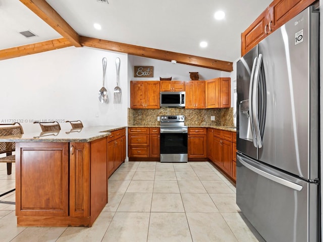 kitchen featuring a breakfast bar, vaulted ceiling with beams, stainless steel appliances, tasteful backsplash, and kitchen peninsula