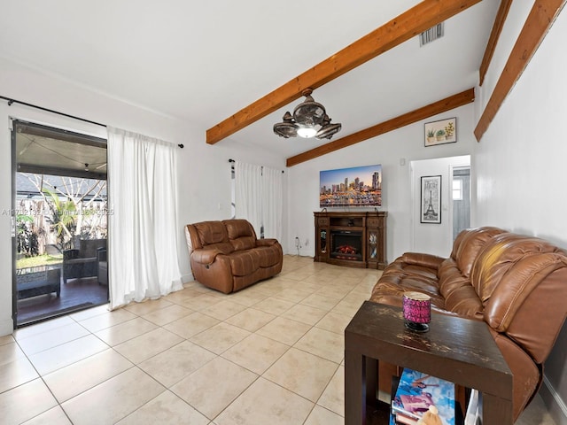 living room with light tile patterned floors, lofted ceiling with beams, and ceiling fan