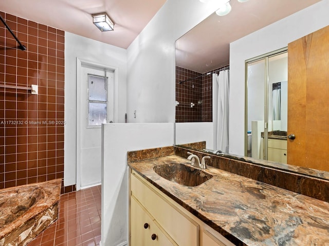 bathroom featuring vanity and tile patterned floors