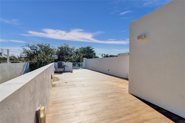 view of patio featuring a balcony