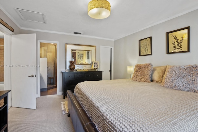 bedroom with ornamental molding and carpet flooring