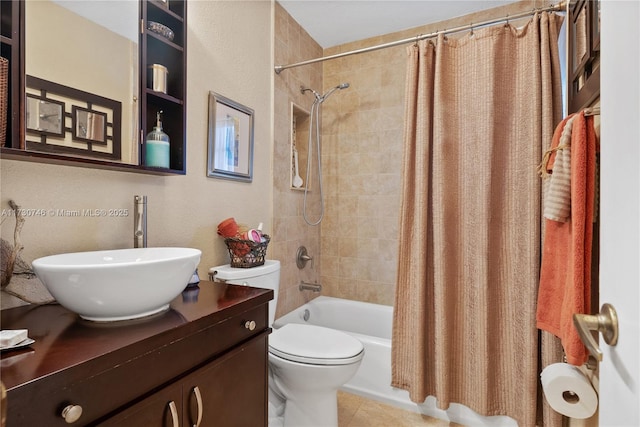 full bathroom featuring vanity, shower / bath combination with curtain, tile patterned floors, and toilet