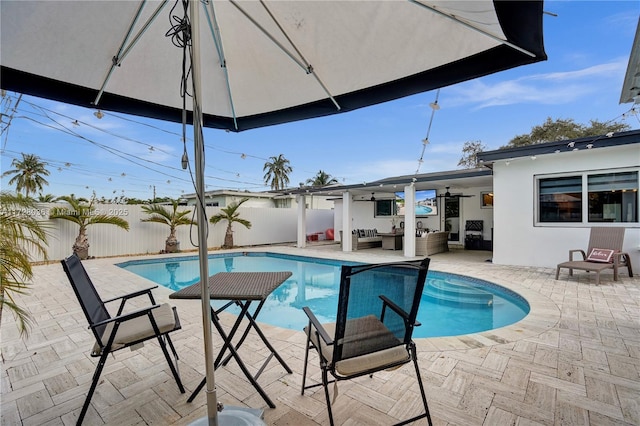 view of swimming pool featuring a patio and an outdoor hangout area