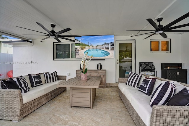 living room with ceiling fan