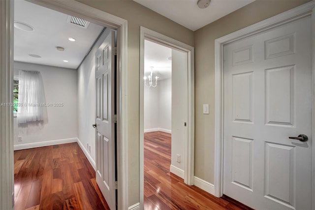 hall featuring wood-type flooring