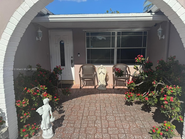 view of patio featuring a porch