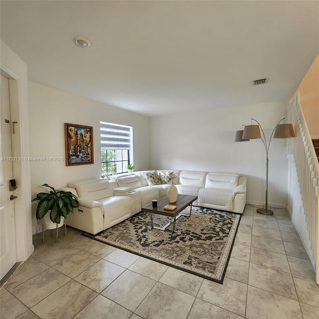 living room featuring light tile patterned floors