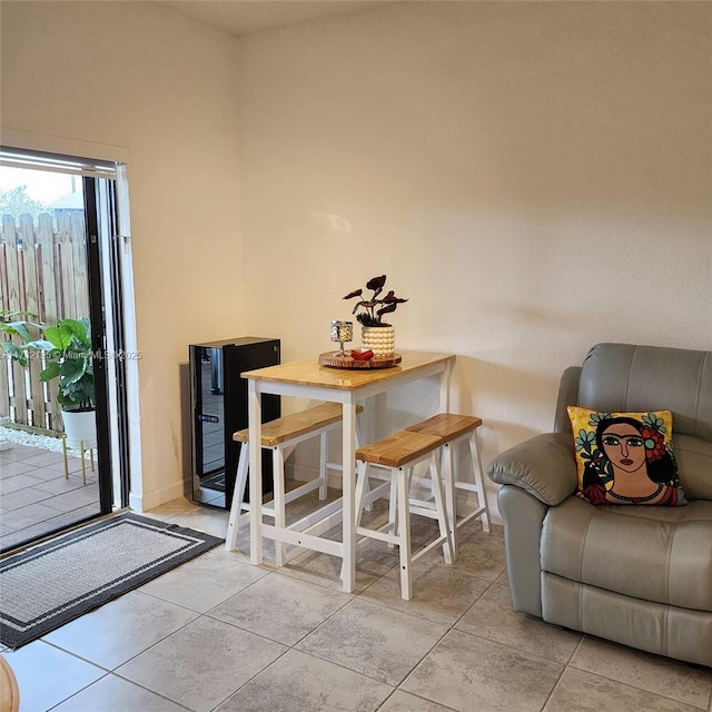 dining area with light tile patterned flooring