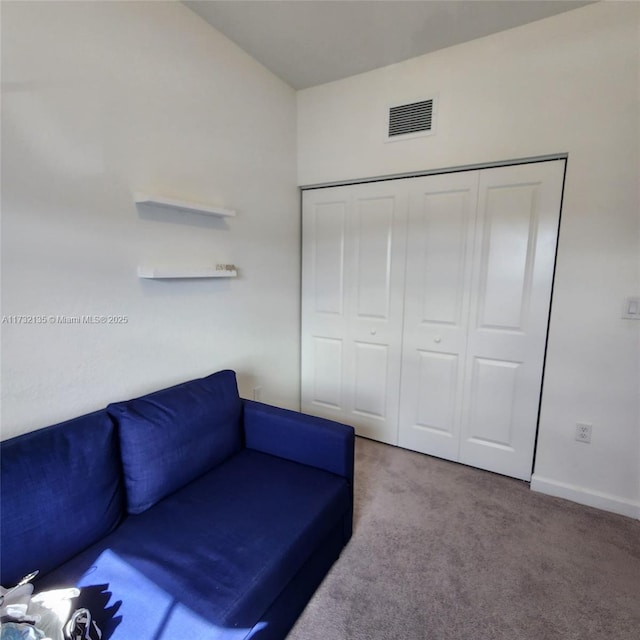 unfurnished room with light colored carpet