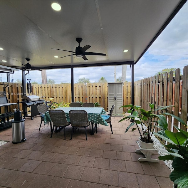 view of patio featuring a grill and ceiling fan