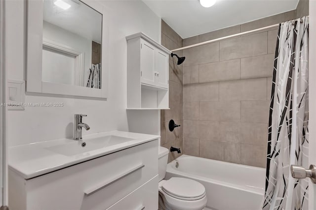 full bathroom featuring shower / tub combo with curtain, vanity, and toilet