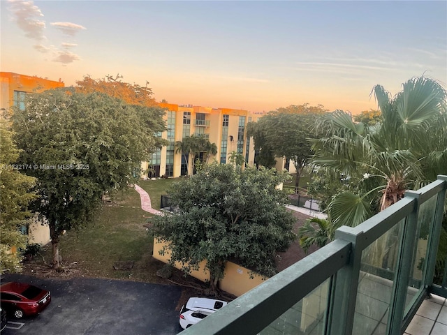 view of balcony at dusk