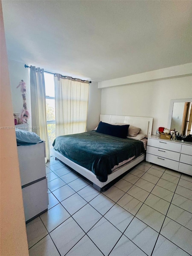 11780 SW 18th St Unit 510-2, Miami, FL 33175 - bedroom with light tile patterned floors