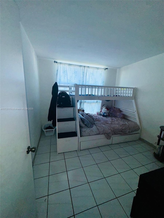 11780 SW 18th St Unit 510-2, Miami, FL 33175 - tiled bedroom with baseboards