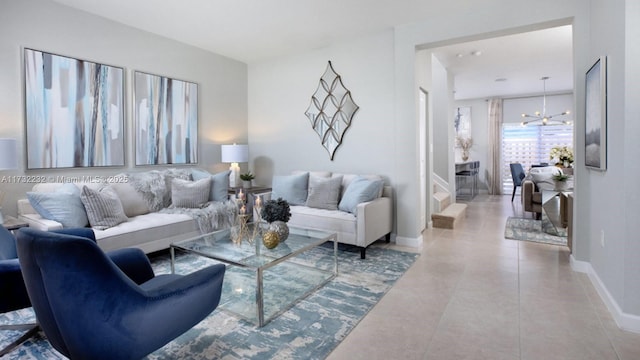 living room with a notable chandelier