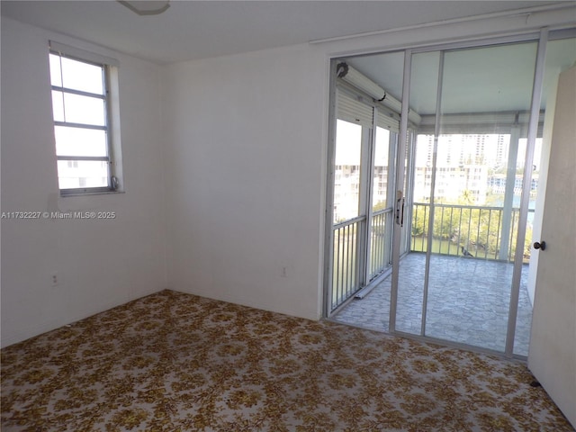 view of carpeted spare room