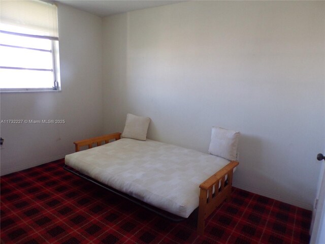 exercise room with carpet flooring