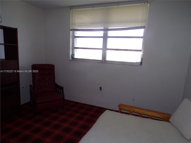 unfurnished room featuring a wealth of natural light