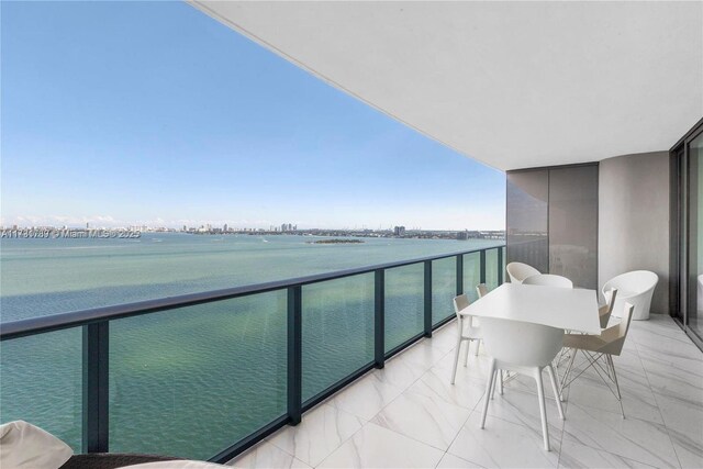 living room with floor to ceiling windows