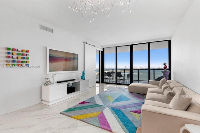 living room with baseboards, visible vents, marble finish floor, expansive windows, and a chandelier