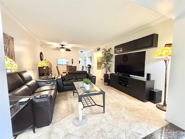 tiled living room featuring crown molding and ceiling fan