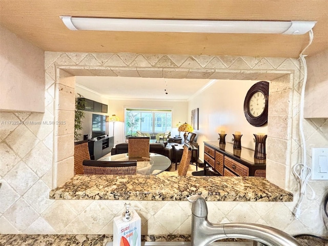 kitchen featuring crown molding