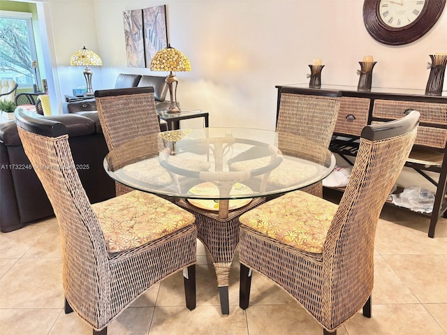 dining space with light tile patterned flooring