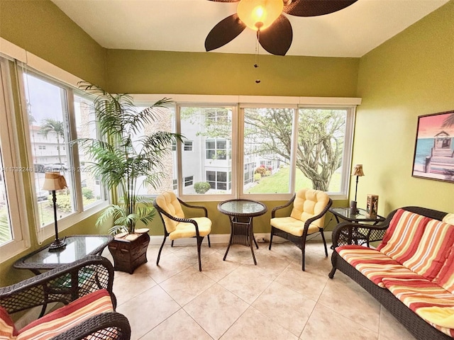 sunroom / solarium with plenty of natural light and ceiling fan